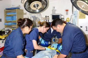 Doctor provides trauma training to a team of Emergency Medical Technicians