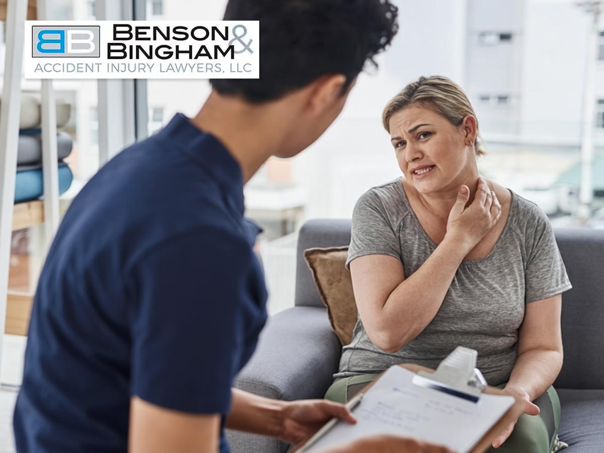 Chiropractor assisting a patient with neck pain for a personal injury case, guided by experienced Las Vegas Personal Injury Lawyers