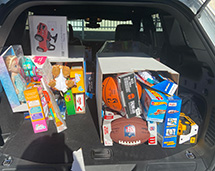 Car With Toy Donations For The Shade Tree