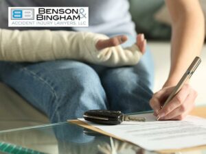 Injured man signing Compensation agreement for a Car Accident in Nevada