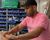 Volunteer Printing Cancer Awareness Month With Benson & Bingham logo