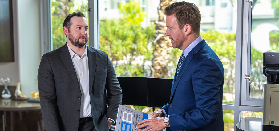 Ben Bingham talking with Tye Masters, in LV office
